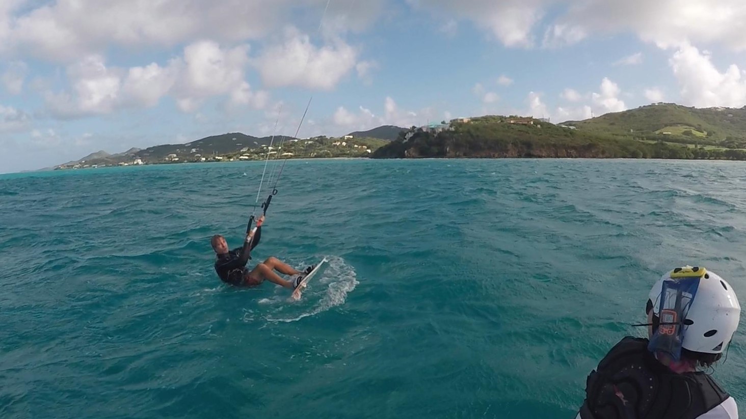 Kiteboarding lesson.  This student is learning to water start in the US Virgin Islands
